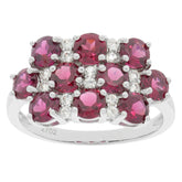 Elegant sterling silver ring featuring multiple round red gemstones and sparkling accents for sophisticated style.